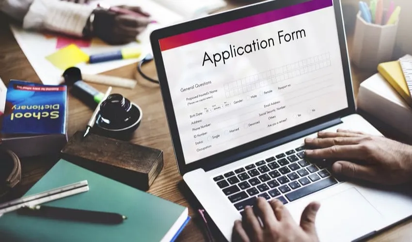 Candidate filling JEE Main 2027 online application form on laptop